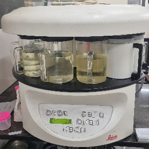 Automated benchtop rotary tissue processor for Biopsy specimens